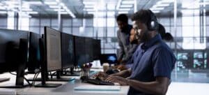 IT support specialist handling a Tier 1 and Tier 2 support escalation workflow